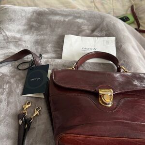 Leather top quality Oroton Deep Brownish/Burgandy Satchel with cross strap